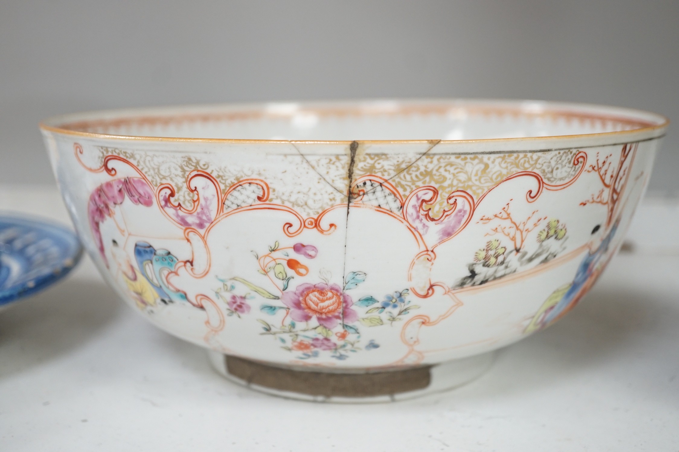 An assortment of Chinese porcelain tin-glazed earthenware charger and a Delft vase